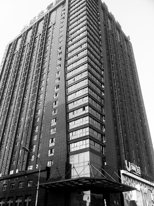 記者按照公開地址在鄭州一處寫字樓尋找一家軟件公司，一無所獲。