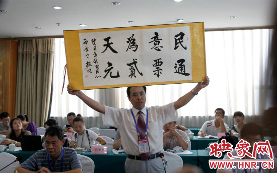 消費者代表李祥表示支持2元通票 消費者代表李祥表示支持2元通票