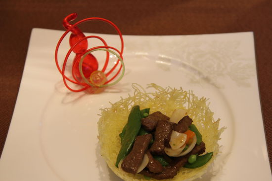 雀巢爆羊柳。 花惠生 供圖