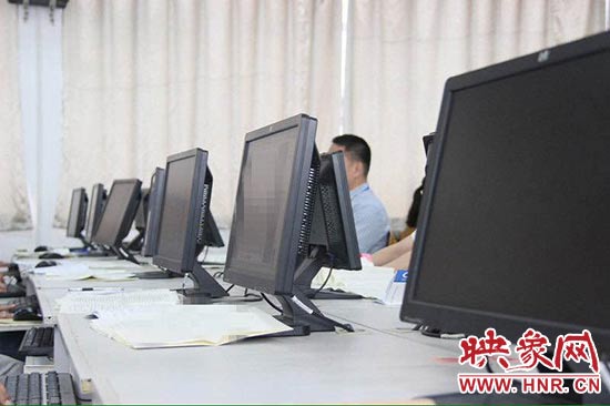 河南2015高考評卷現(xiàn)場 河南2015高考評卷現(xiàn)場