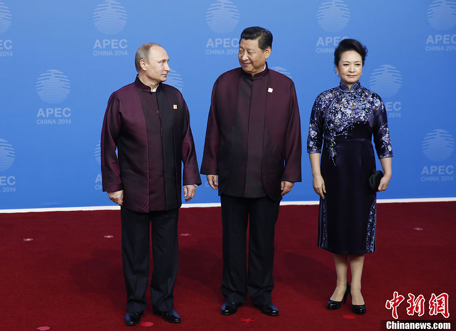 圖為習(xí)近平夫婦歡迎俄羅斯總統(tǒng)普京。中新社發(fā) 杜洋 攝